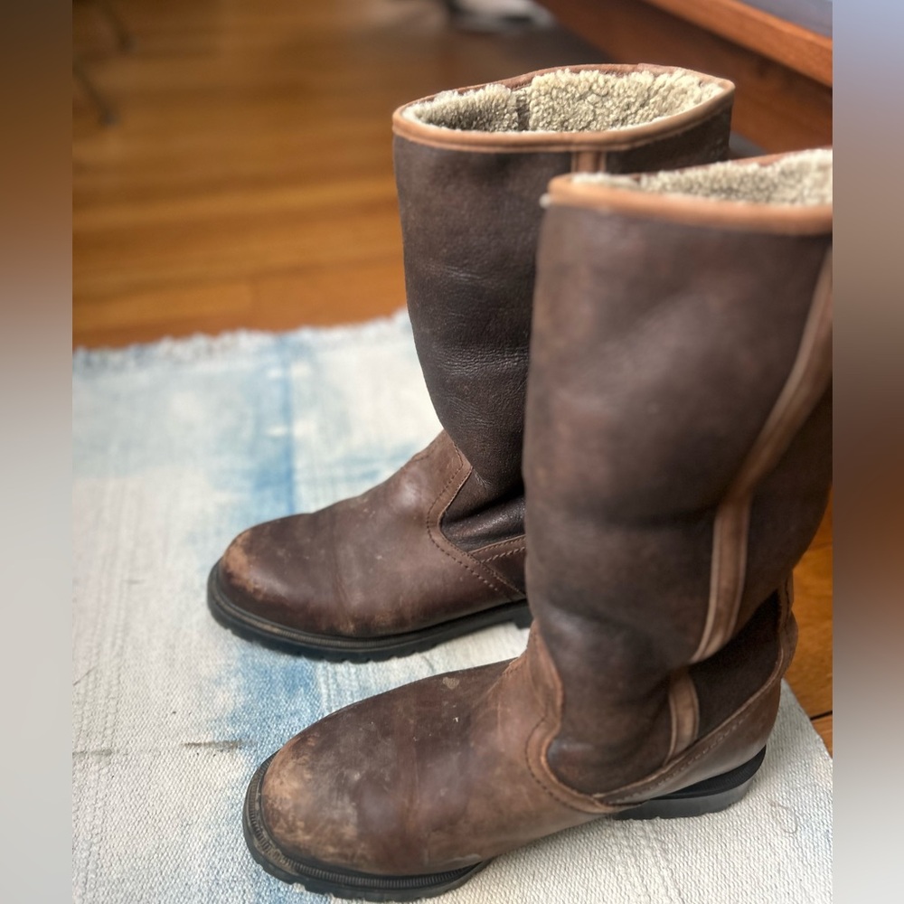 brown leather and shearling tall boots